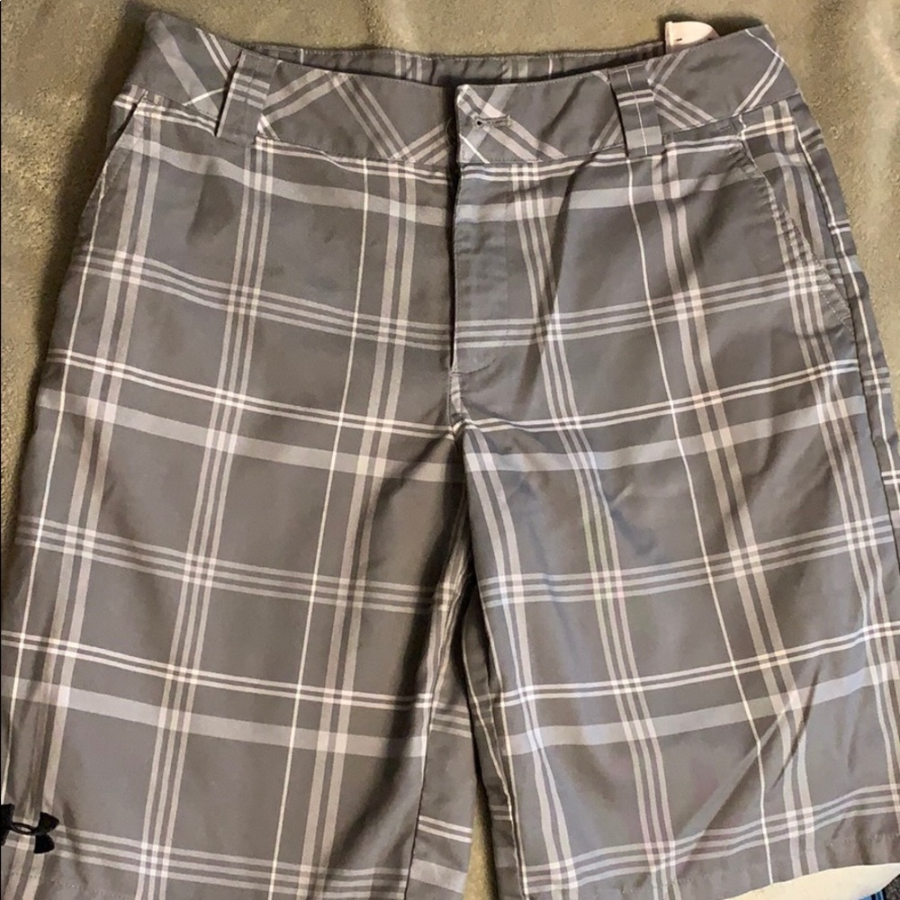Under Armour gray and white shorts.